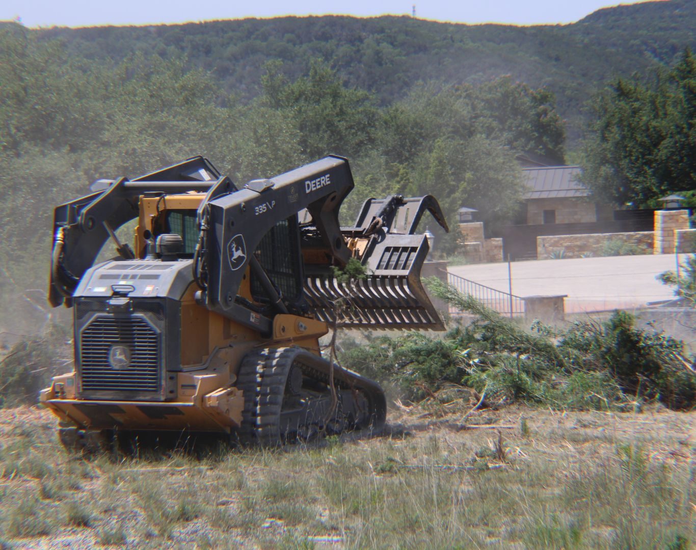 Residential cedar mulching in Mountain City, TX backyards Residential cedar mulching in Mountain City, TX backyards